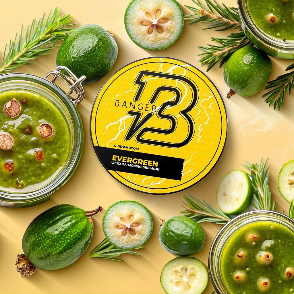 LE TABAC Banger V3 Evergreen hookah flavor container surrounded by fresh feijoa fruits and greenery