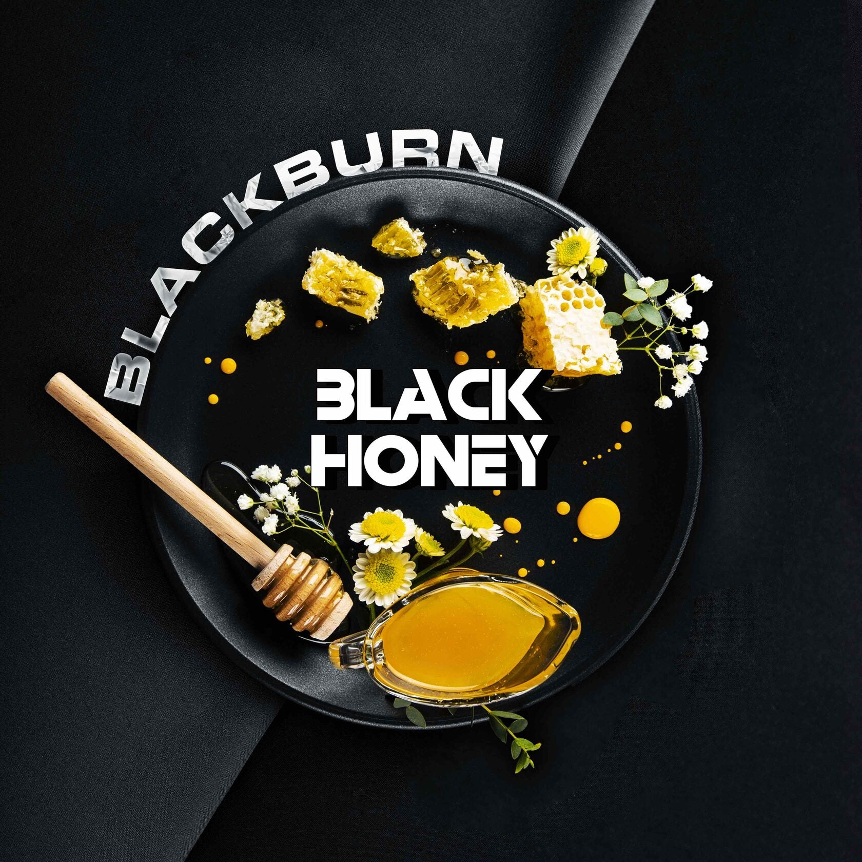Blackburn Black Honey plate with honeycomb pieces, honey dipper, flowers, and honey drizzle