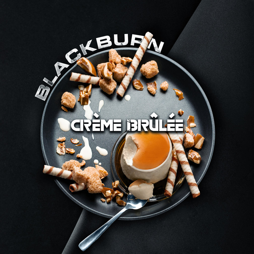 Blackburn Crème Brûlée dessert with caramelized top, wafer sticks, and crunchy toppings on a gray plate