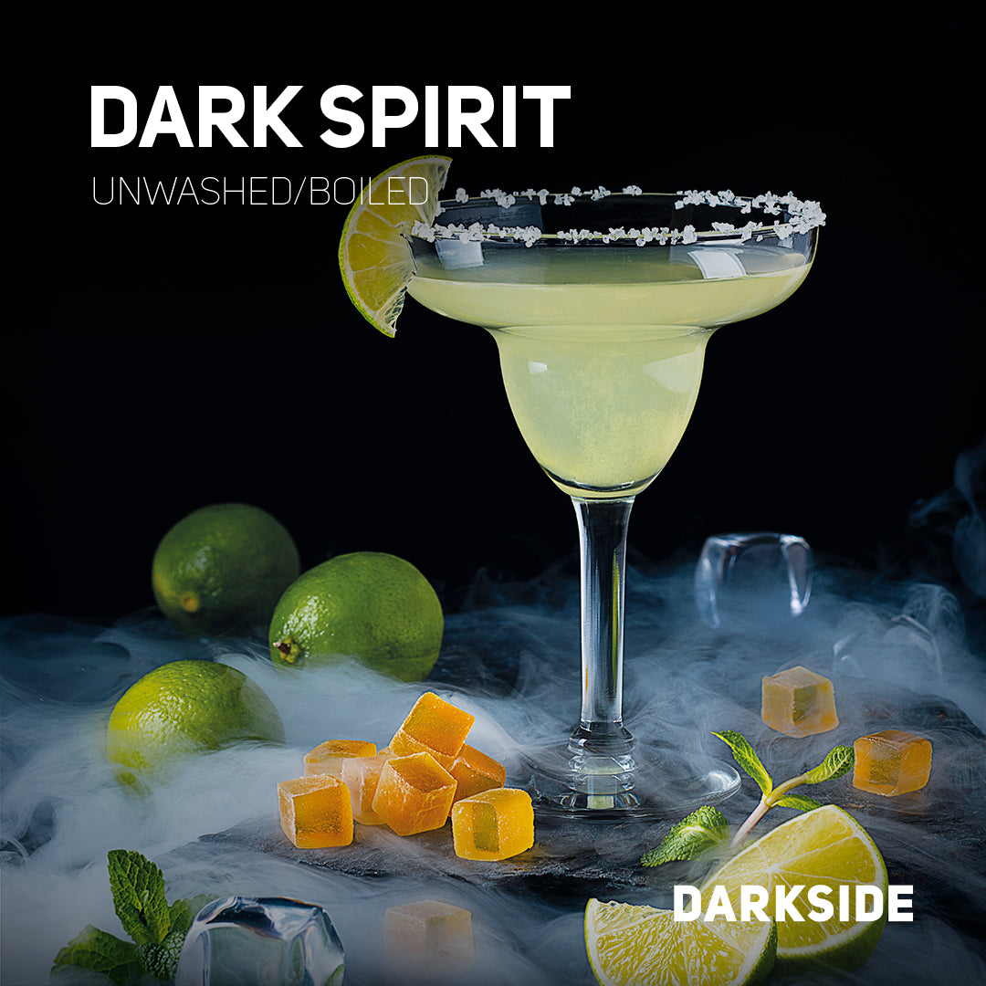 Dark Spirit unwashed boiled cocktail glass with salted rim lime wedges ice cubes and mint leaves