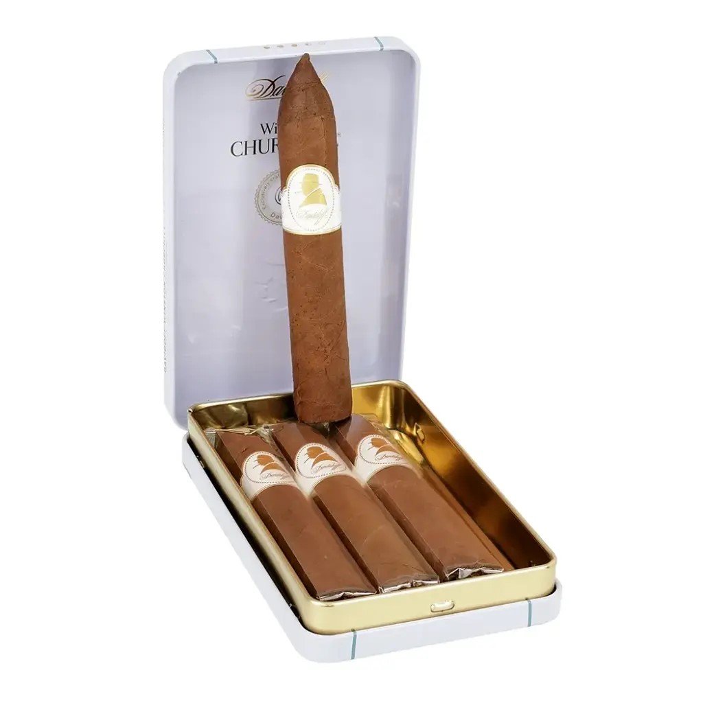 LE TABAC wrapped cigars in a gold and white metal tin with one cigar standing upright