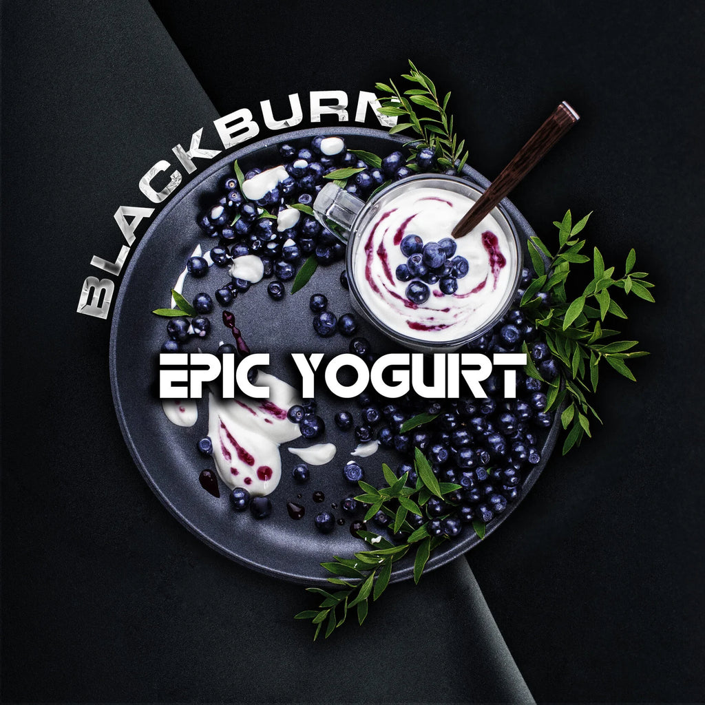 Epic yogurt with fresh blackberries and cream in a bowl garnished with green leaves